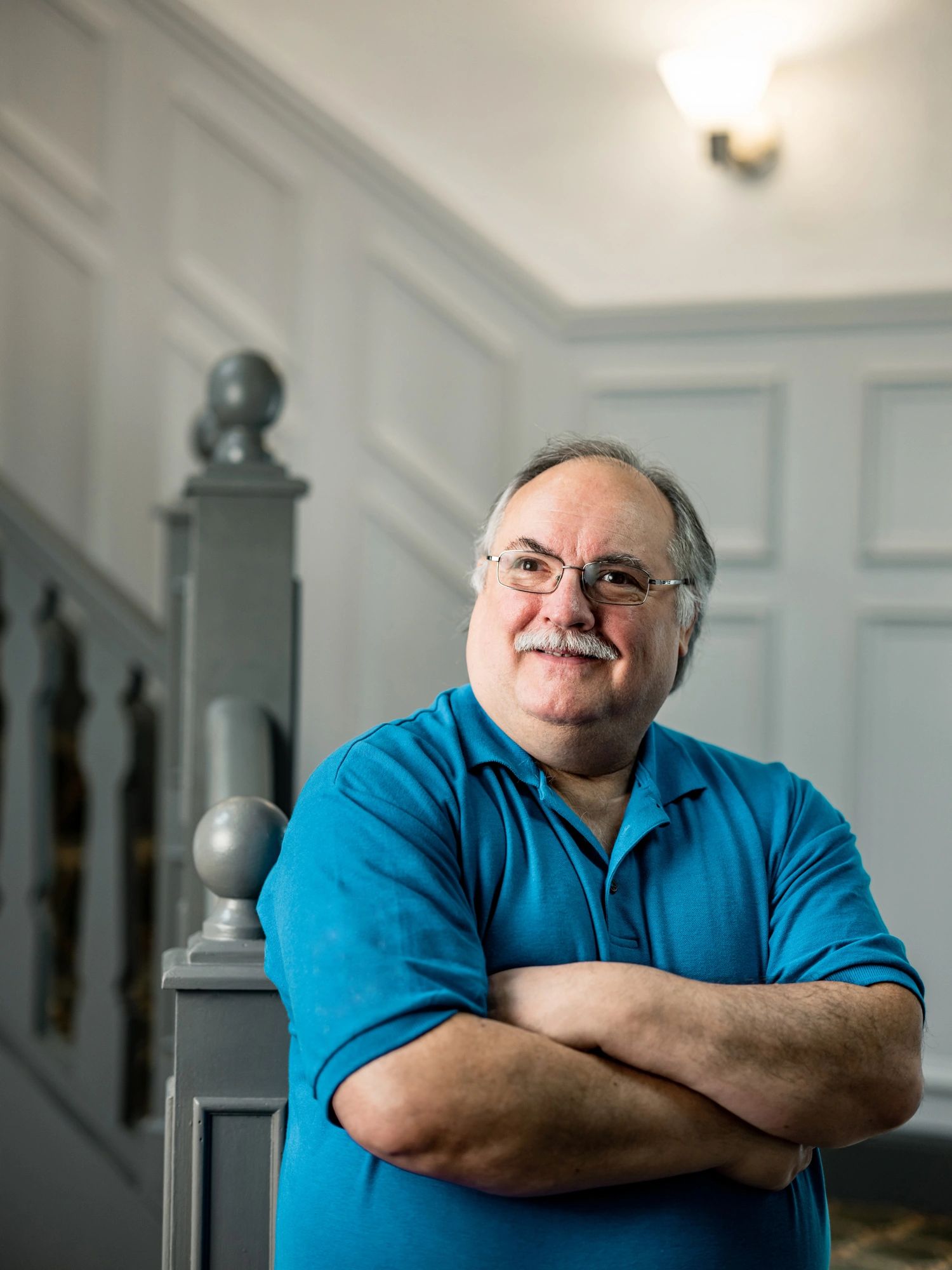 Professional portrait of a man with glasses